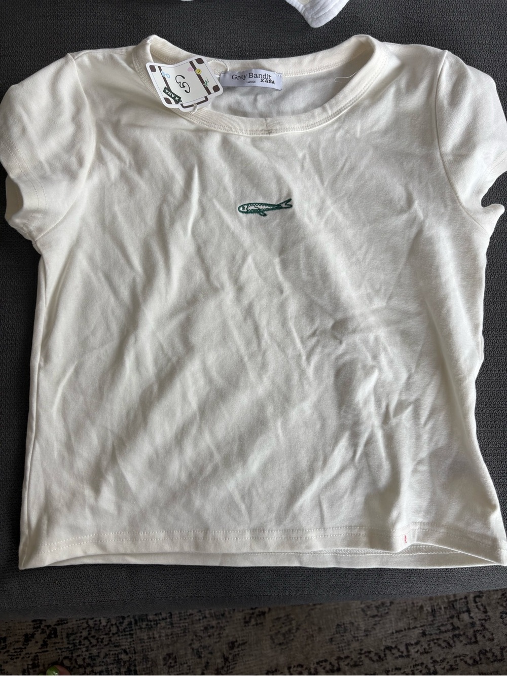 Grey Bandit Cream Short Sleeve Tee with Green Embroidered Logo